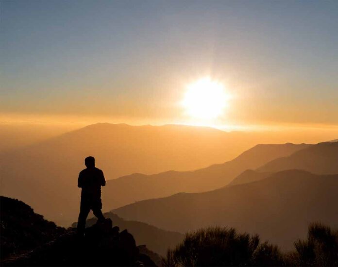Mann Berg Sonnenuntergang